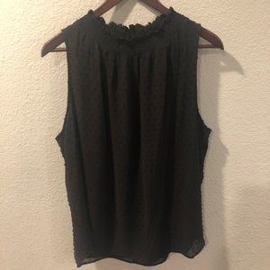 Black polka dot top with slit in the back